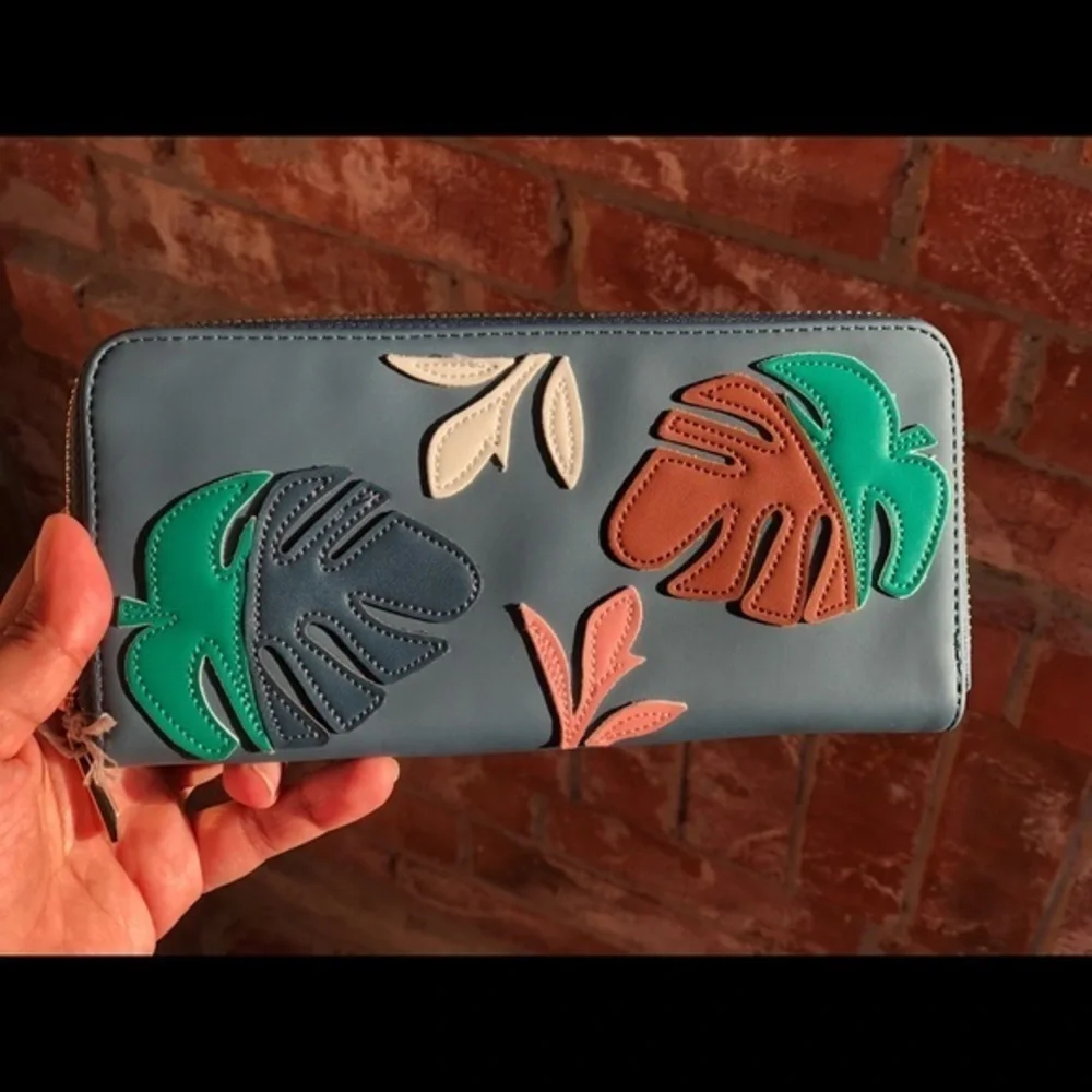 Beautiful wallet in blue color multi leaf print